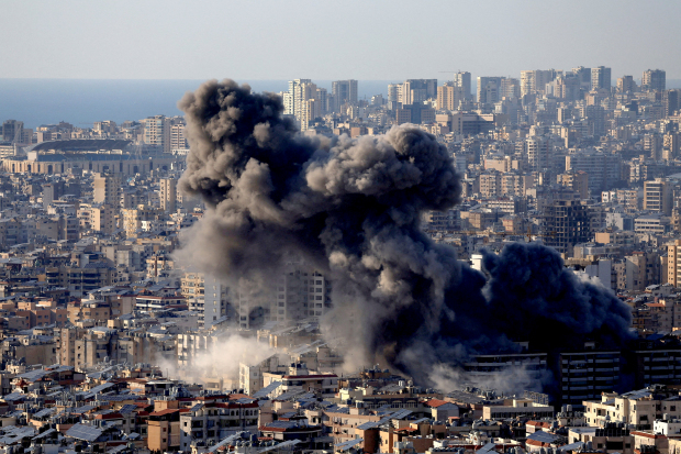 Strike hits Beirut apartment as heavy bombardment continues